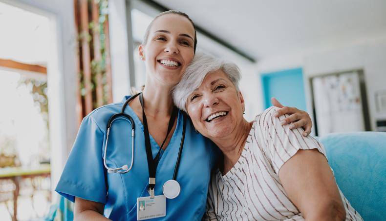 Doctor with Arm Around Patient