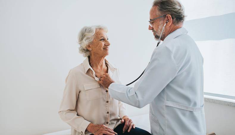 Doctor Checking Patient's Heartbeat