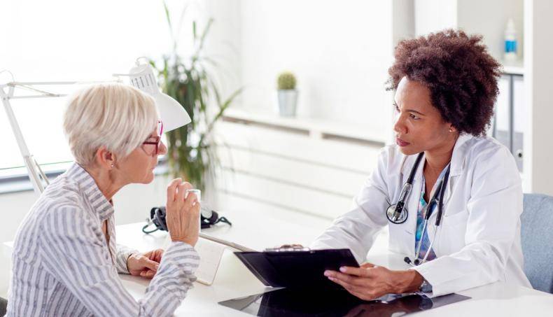 Patient Speaking to Doctor
