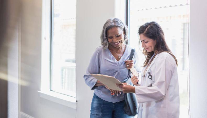 Doctor Showing Patient Chart