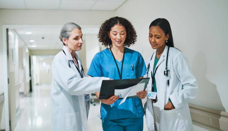 Physicians Looking at a Chart