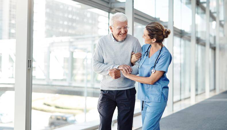 Nurse helping patient