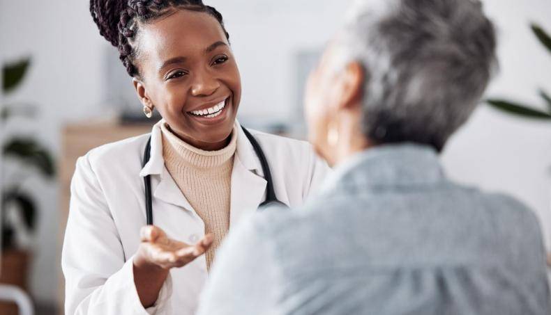 Doctor talking with patient
