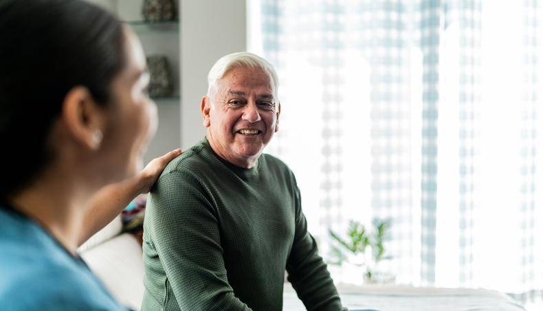 Nurse and patient sitting 