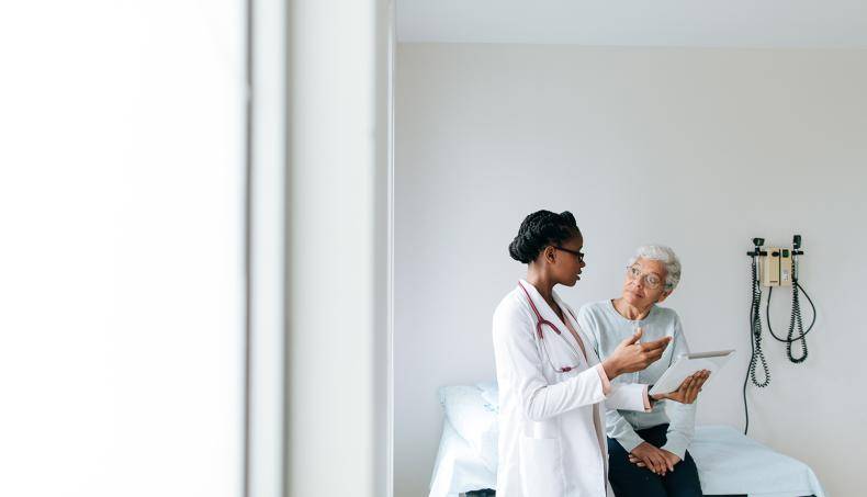 Doctor and patient talking