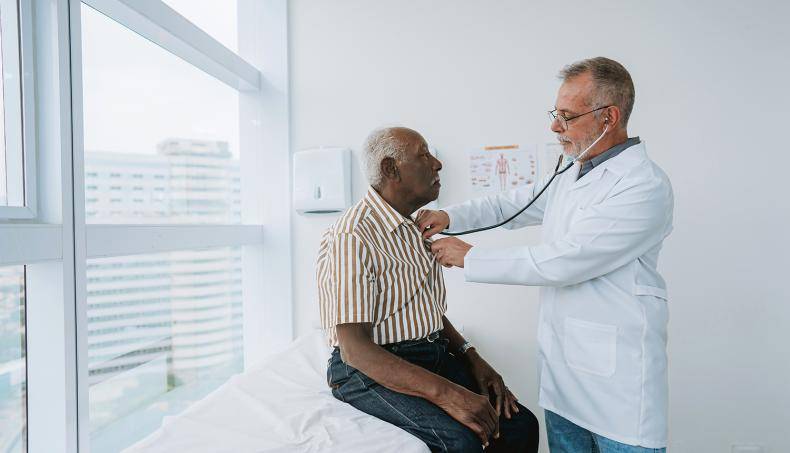 Doctor checking up patient