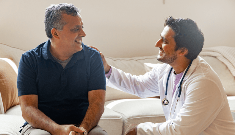 Doctor speaking with senior about cognitive health