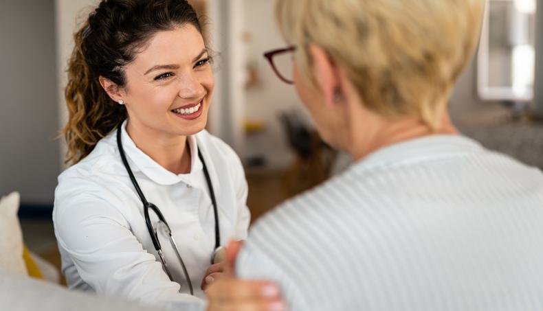 Doctor comforting patient