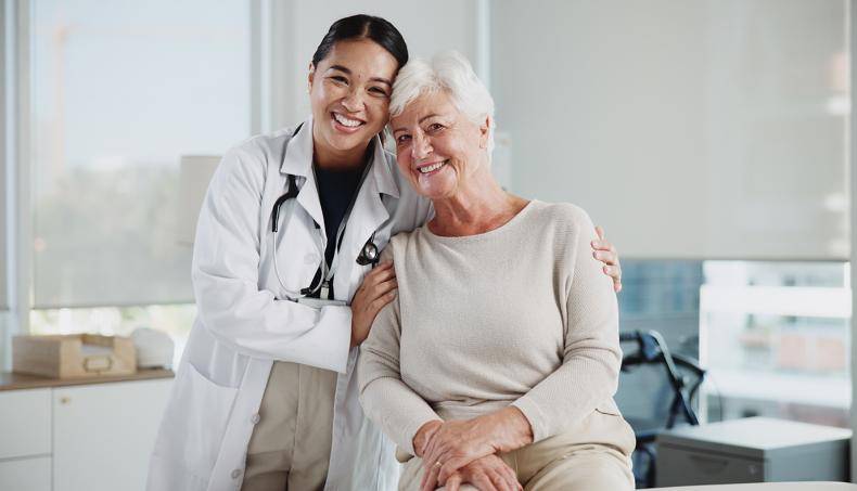 Patient and doctor embracing and smiling; Patient advocacy