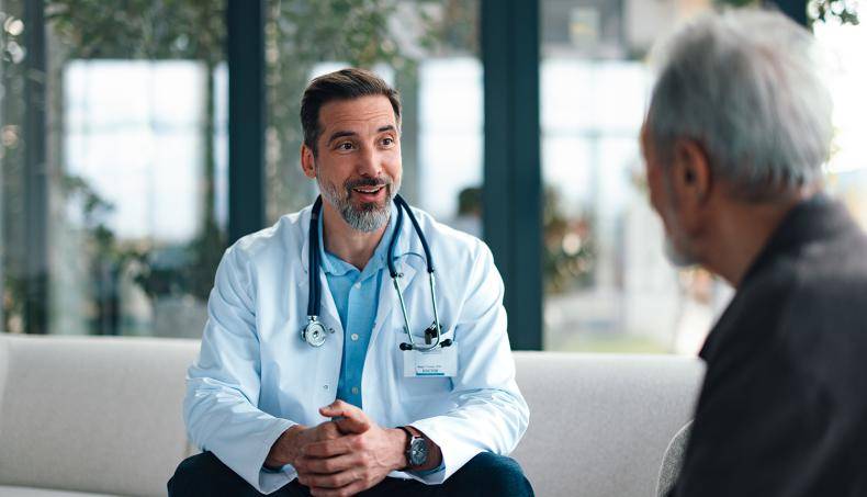 Physician discussing care plan with patient