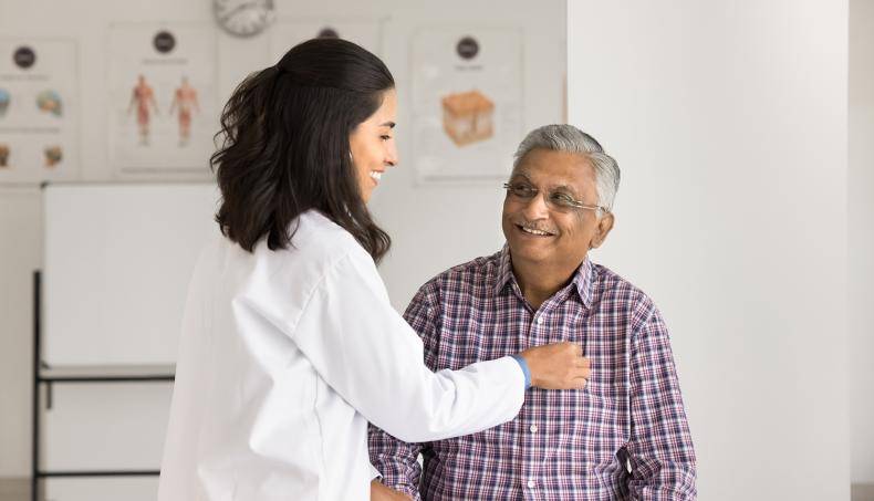 Physician consulting with patient about cancer risks