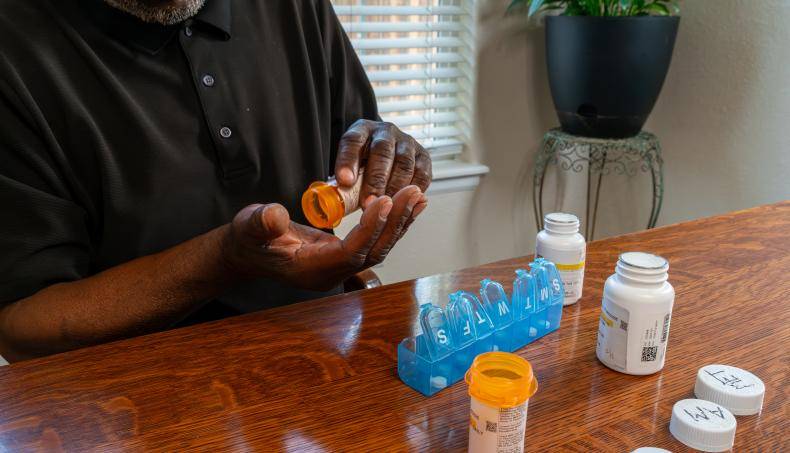 Senior organizing their medication