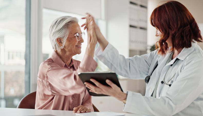 Doctor speaking with senior patient