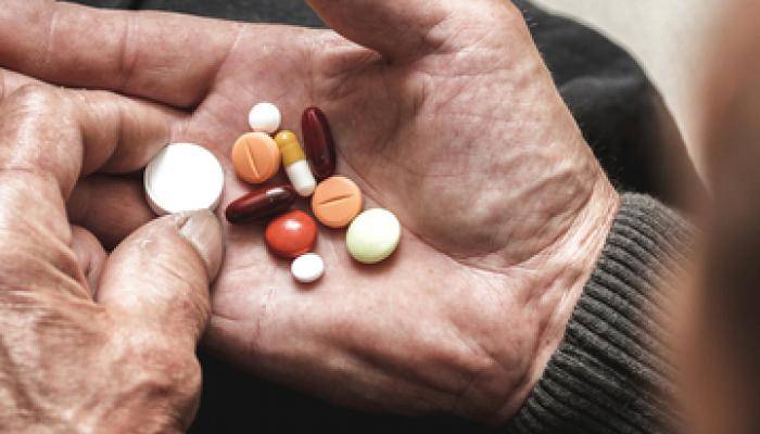 Hand holding medicine