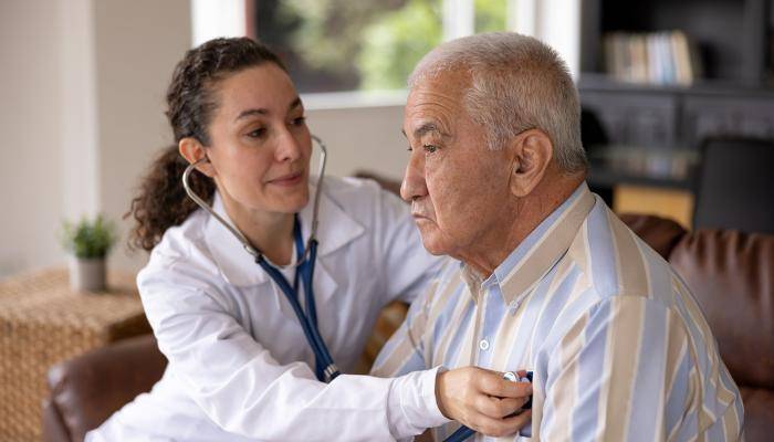 Doctor Checking Patient's Heart