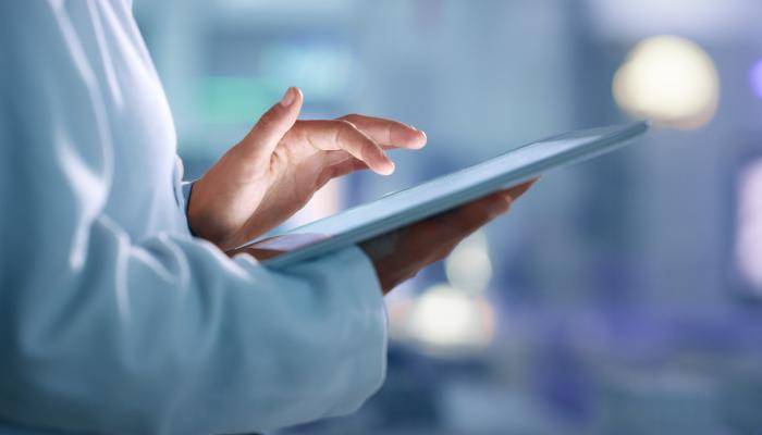 Physician Holding a Tablet