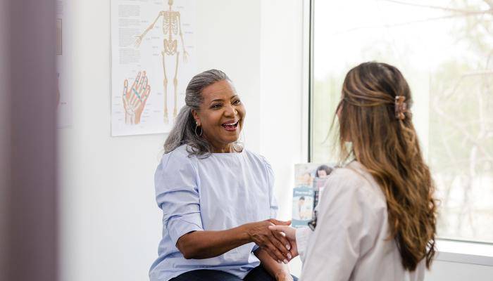 Doctor and Patient Shaking Hands