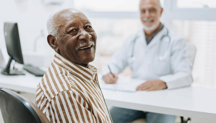 Senior Smiling at Camera