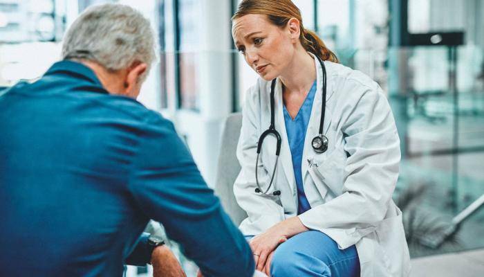 Physician Speaking to Senior Patient