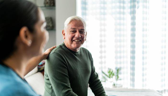 Nurse and patient sitting 