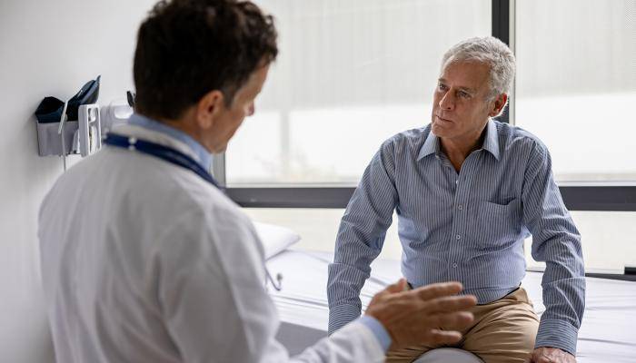 Senior speaking with their primary care physician