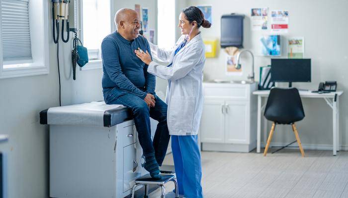 Senior being checked by their primary care physician.