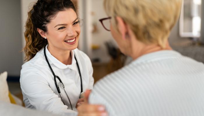 Doctor comforting patient