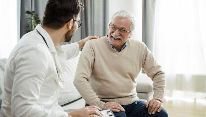 Primary Care Physician and patient having a health talk