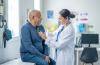 Doctor Checking Patient's Heartbeat