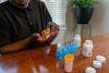 Senior organizing their medication
