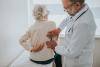 Doctor checking a patient for bone and joint decline