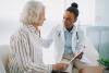 Physician speaking with senior patient